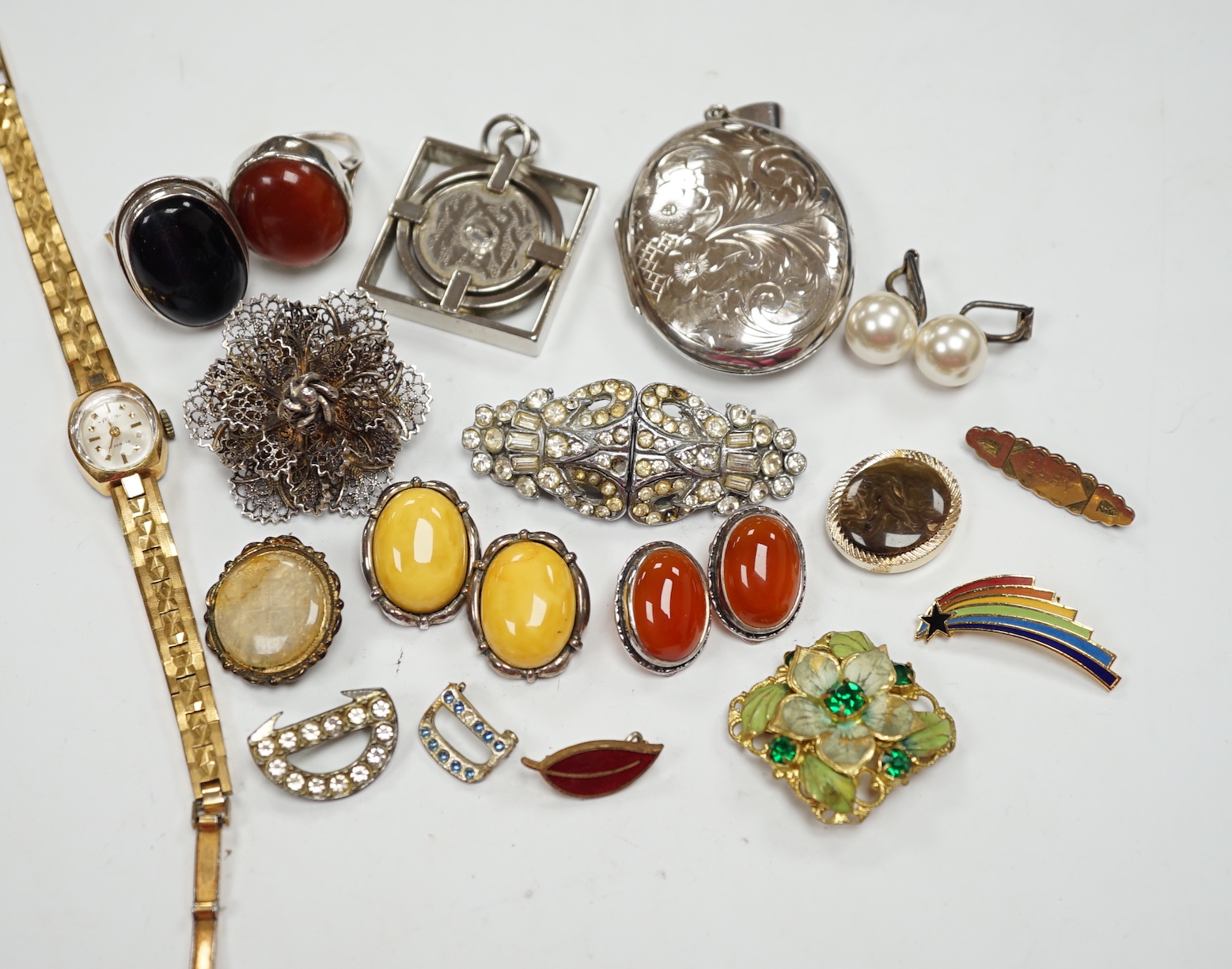 A silver and cabochon set dress ring, mixed costume jewellery and a lady's wrist watch.